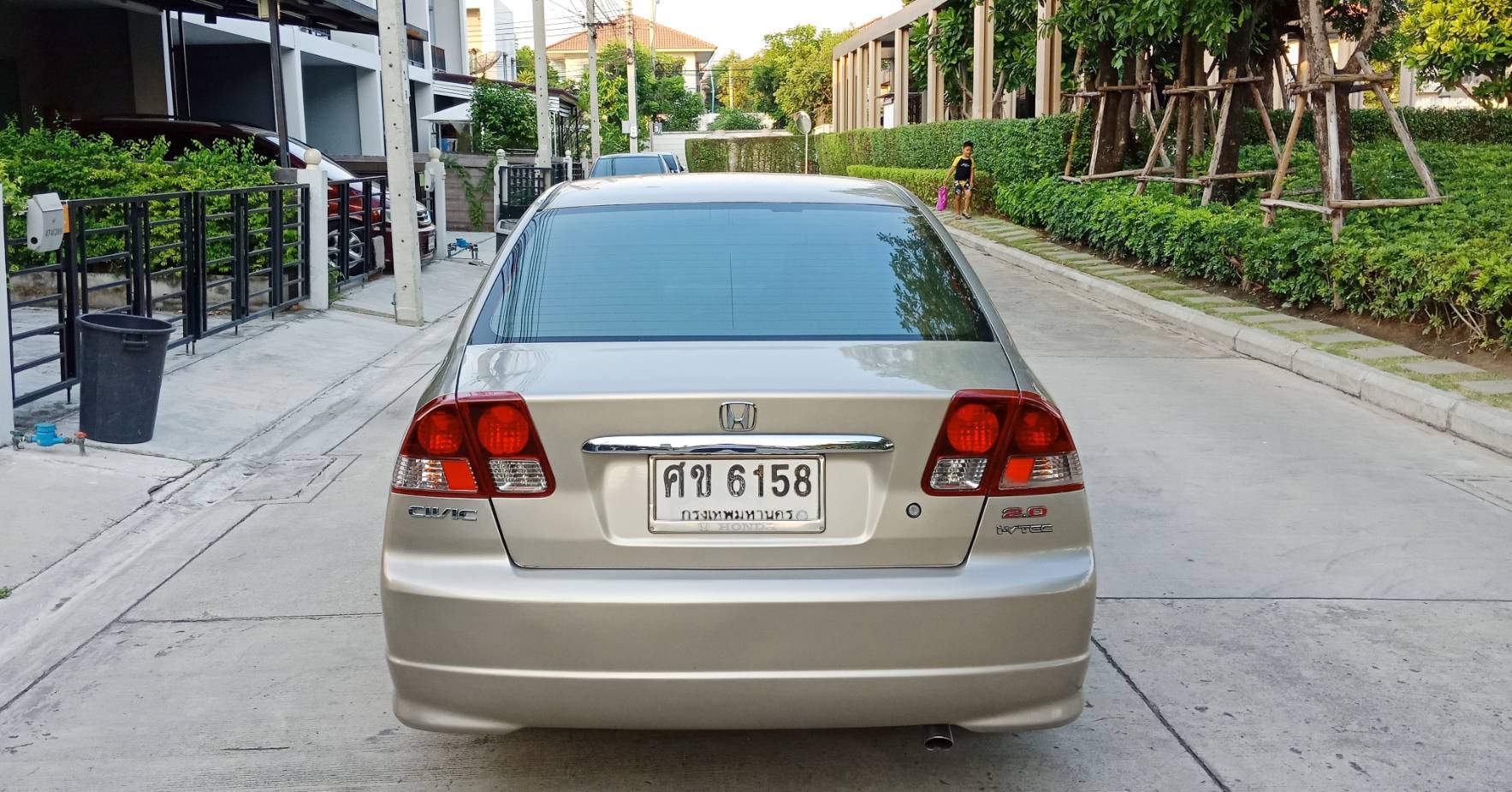 Honda Civic ES (Dimension) โฉม ตาเหยี่ยว ปี 2004 สีทอง