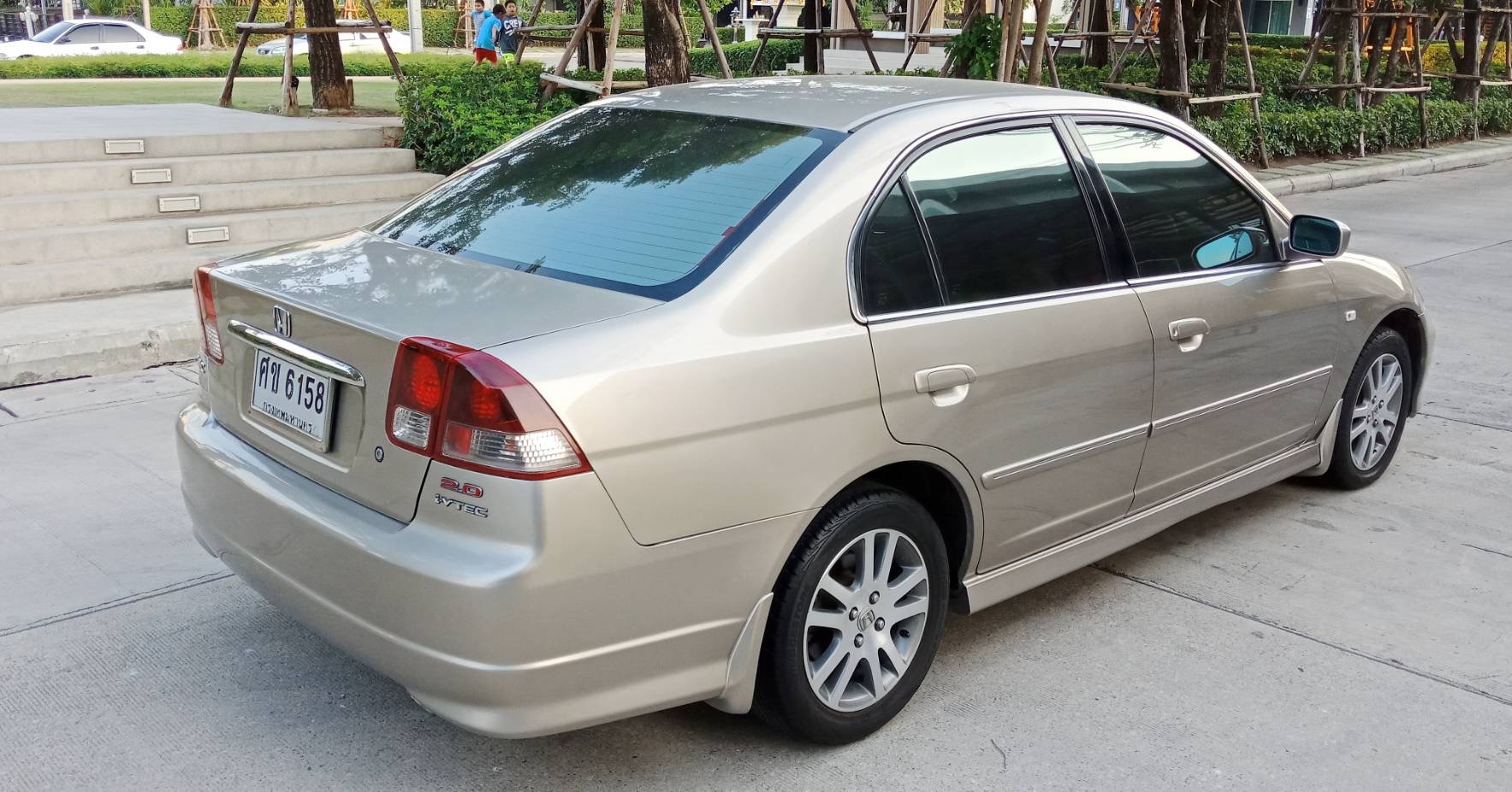 Honda Civic ES (Dimension) โฉม ตาเหยี่ยว ปี 2004 สีทอง