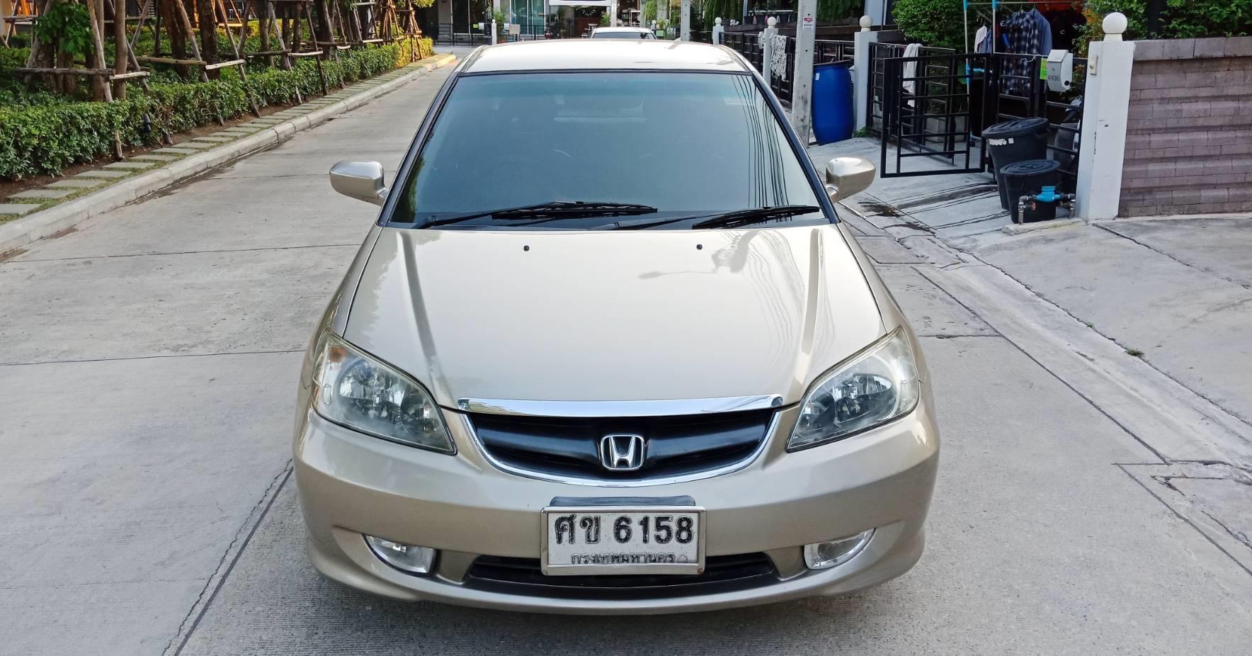 Honda Civic ES (Dimension) โฉม ตาเหยี่ยว ปี 2004 สีทอง