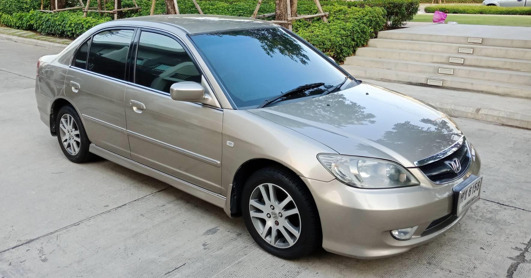 Honda Civic ES (Dimension) โฉม ตาเหยี่ยว ปี 2004 สีทอง