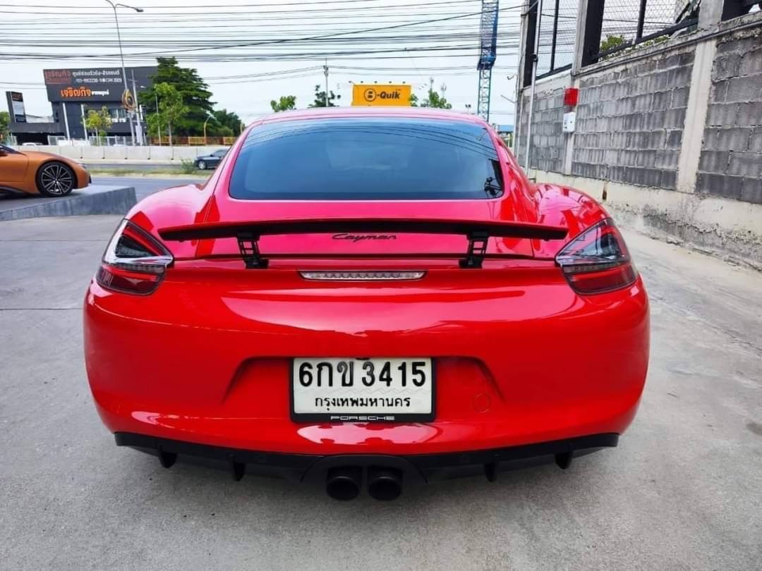 2015 Porsche Cayman สีแดง