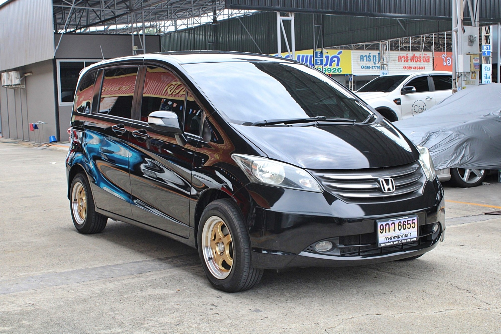 2012 Honda Freed 1.5 EL Wagon AT สีดำ เกียร์ออโต้ รถครอบครัว7ที่นั่ง รถบ้าน ออกห้างมือเดียว รถสวยไม่มีชน มีประวัติเช็คศูนย์