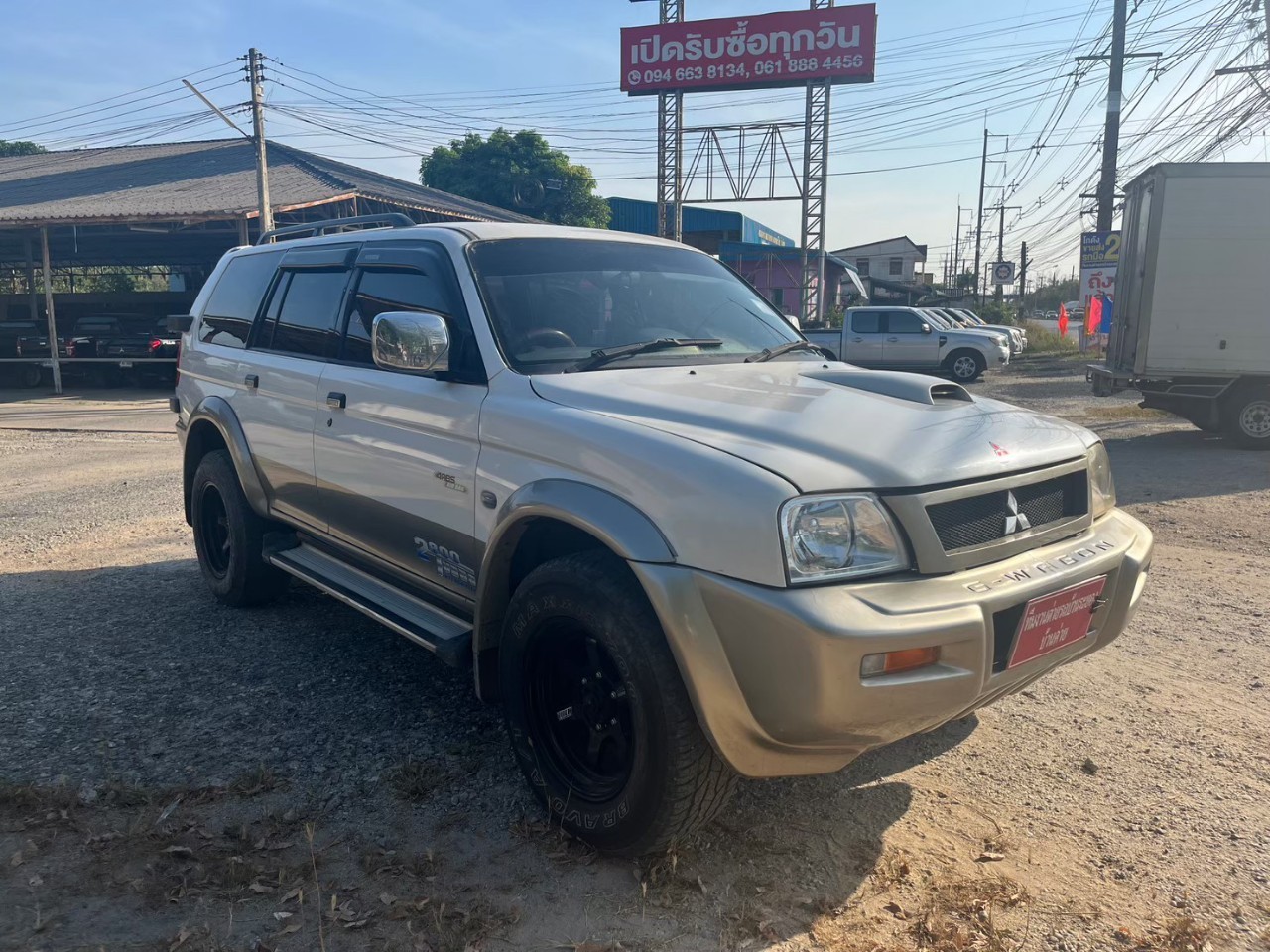 2006 Mitsubishi Strada G-Wagon สีขาว