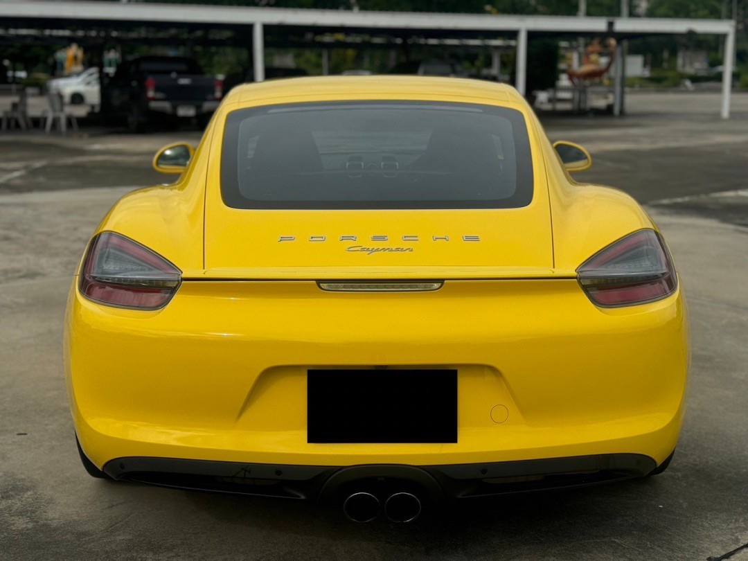 2016 Porsche 981 Cayman สีเหลือง