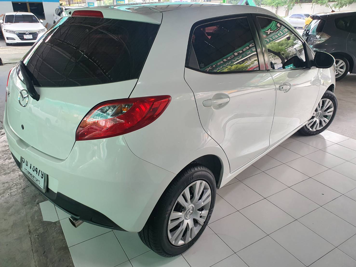 ขาย Mazda 2 สีขาว 5ประตู ปี2010 เกียร์ธรรมดา มือหนึ่งวิ่งน้อย