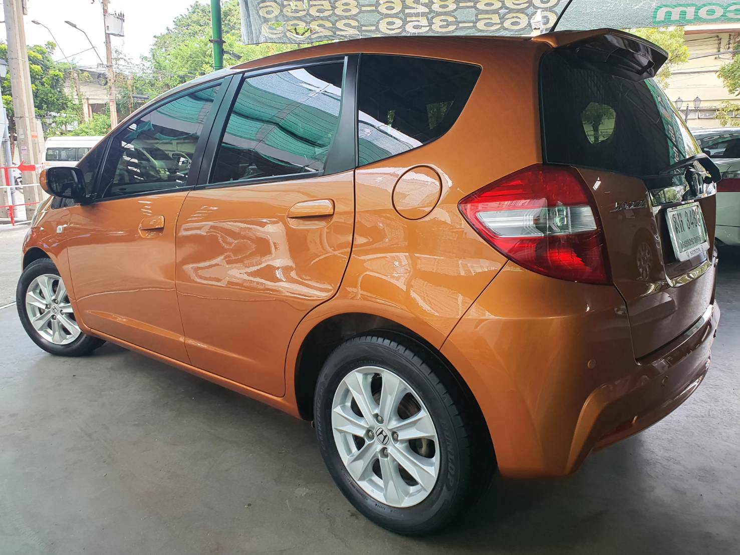 Honda Jazz 1.5V(AS) ปี 2012 สีส้ม มือ1 ไมล์น้อย